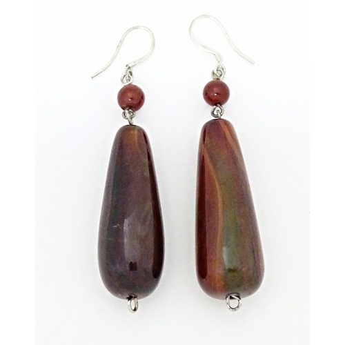 643 - A pair of agate drop earrings. Approx. 2