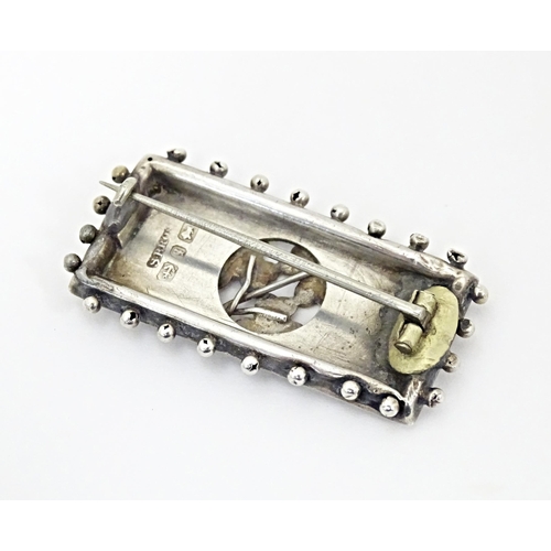 644 - A 9ct gold bar brooch set with central shell carved cameo and seed pearl detail. Together with a Vic... 