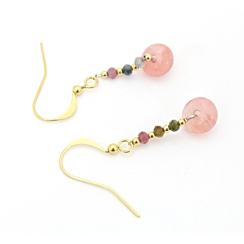 645 - A pair of drop earrings set with tourmaline. Approx. 1