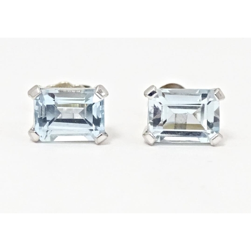 647 - A pair of 18ct white gold stud earrings set with aquamarine