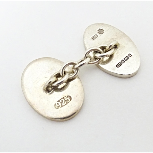 659 - A pair silver cufflinks with gilt detail, hallmarked Sheffield 2000