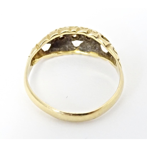 573 - An 18ct gold gypsy ring set with diamonds, hallmarked Chester 1919. Ring size approx. K 1/2