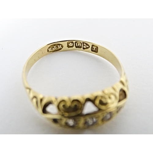 573 - An 18ct gold gypsy ring set with diamonds, hallmarked Chester 1919. Ring size approx. K 1/2