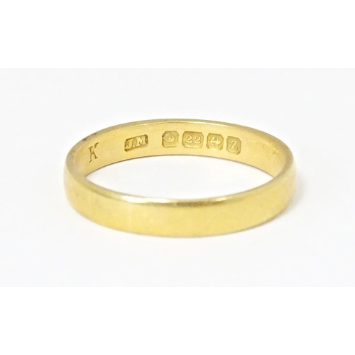 577 - A 22ct gold ring hallmarked Birmingham 1924. Ring size approx. N