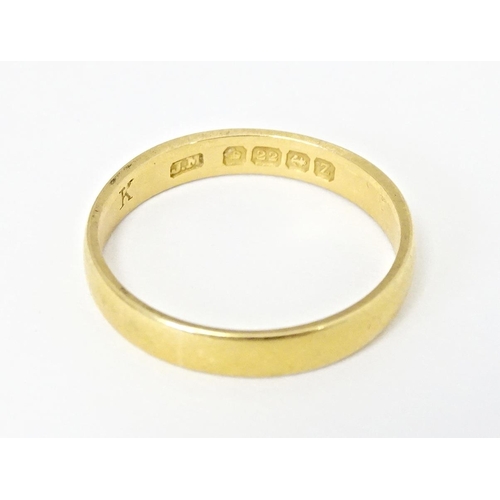 577 - A 22ct gold ring hallmarked Birmingham 1924. Ring size approx. N