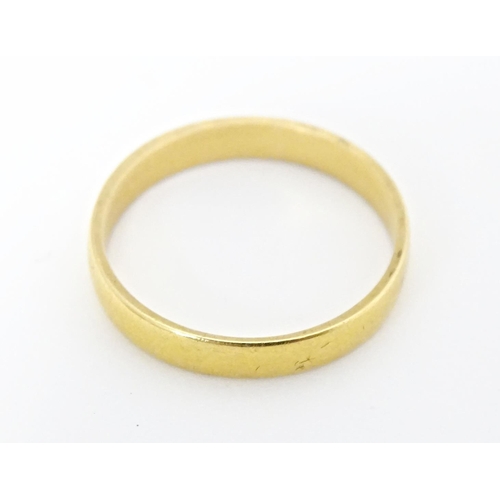 577 - A 22ct gold ring hallmarked Birmingham 1924. Ring size approx. N