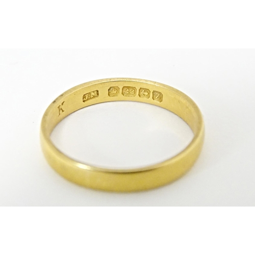 577 - A 22ct gold ring hallmarked Birmingham 1924. Ring size approx. N