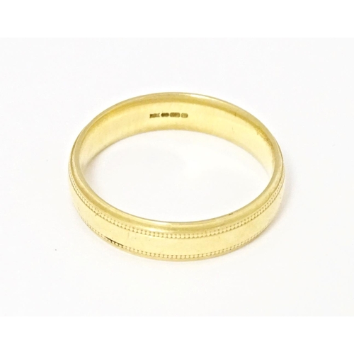 584 - An 18ct gold ring. Ring size approx. S