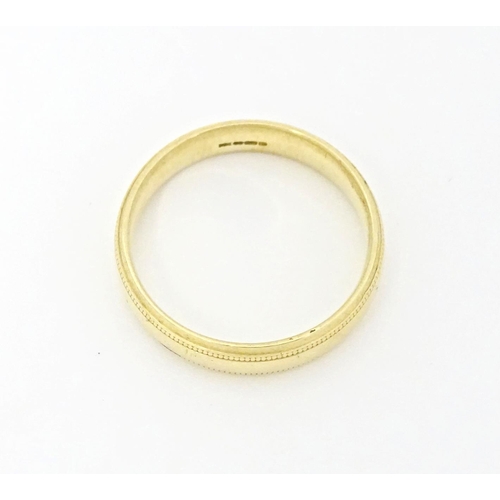 584 - An 18ct gold ring. Ring size approx. S