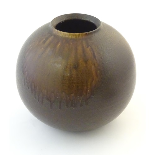 50A - A Japanese vase of globular form with a drip glaze. Approx. 10 3/4