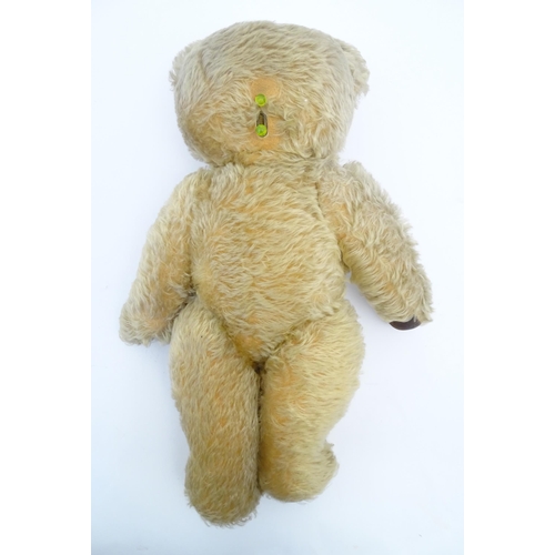 824 - A 20thC mohair teddy bear with moving mouth mechanism, stitched nose, pad paws and articulated limbs... 