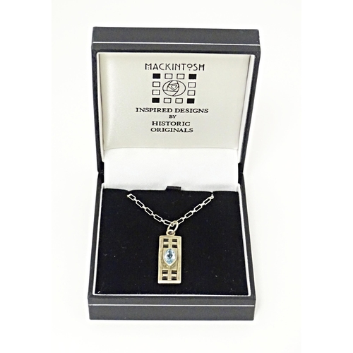 667 - A silver pendant and chain, the pendant inspired by the designs of Mackintosh. The chain 18