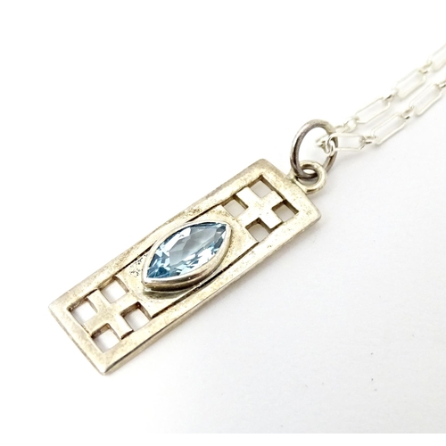 667 - A silver pendant and chain, the pendant inspired by the designs of Mackintosh. The chain 18