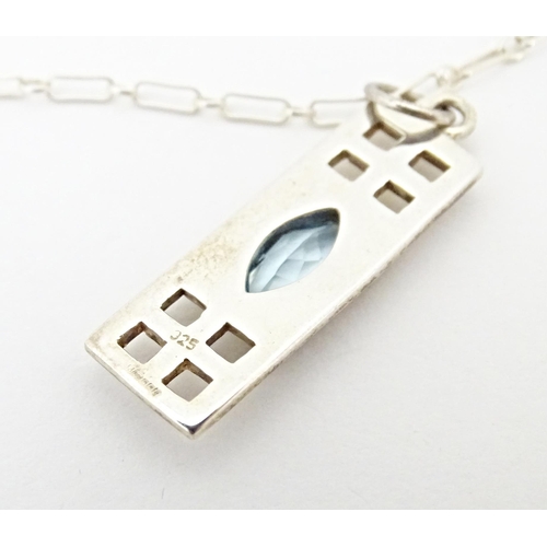 667 - A silver pendant and chain, the pendant inspired by the designs of Mackintosh. The chain 18