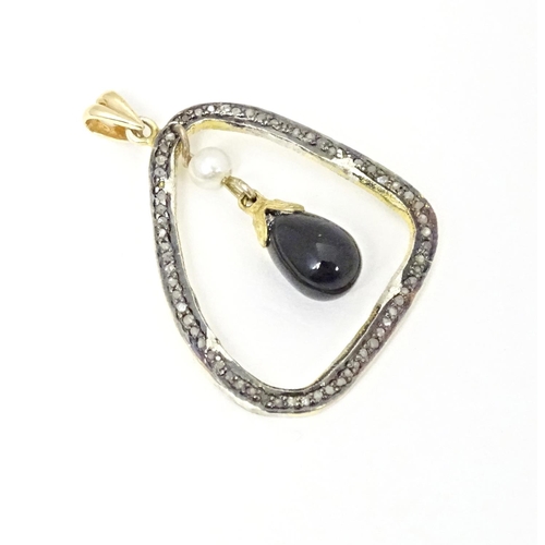 677 - A yellow metal pendant set with diamonds and white stones with central pearl and black onyx drop. Ap... 