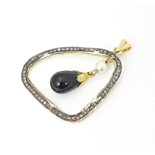 677 - A yellow metal pendant set with diamonds and white stones with central pearl and black onyx drop. Ap... 