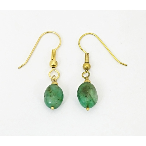 681 - Gilt metal earrings set with jade coloured drops. Approx 1/2