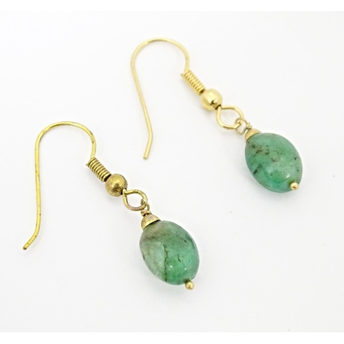 681 - Gilt metal earrings set with jade coloured drops. Approx 1/2