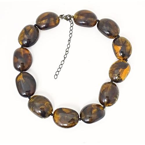 685 - Three assorted bead necklaces with amber coloured beads. Longest approx 30