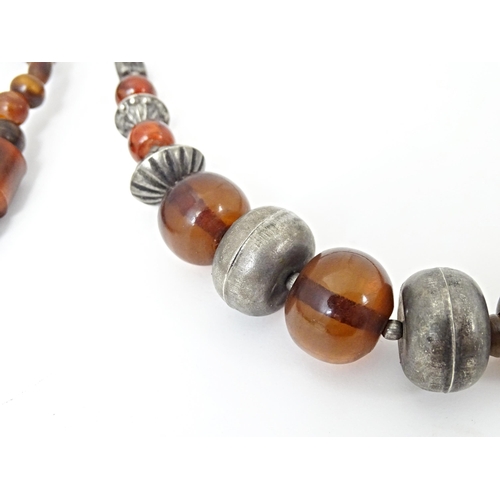 685 - Three assorted bead necklaces with amber coloured beads. Longest approx 30