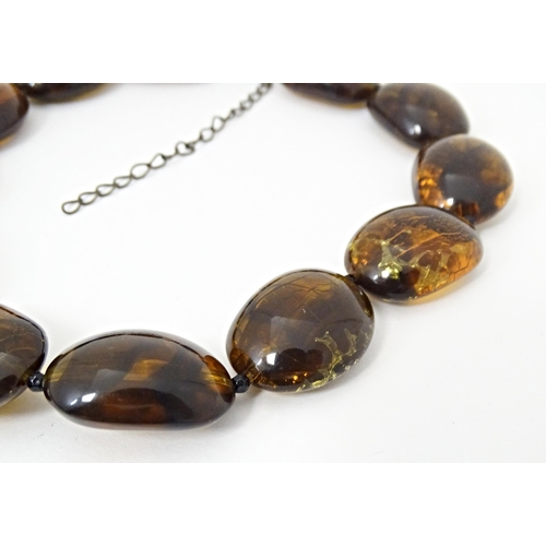 685 - Three assorted bead necklaces with amber coloured beads. Longest approx 30