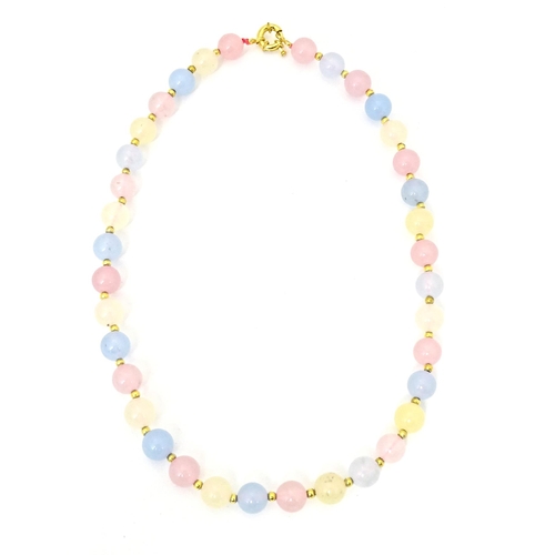 689 - A bead necklace of pink, blue and cream, coloured tourmaline beads. Approx 18