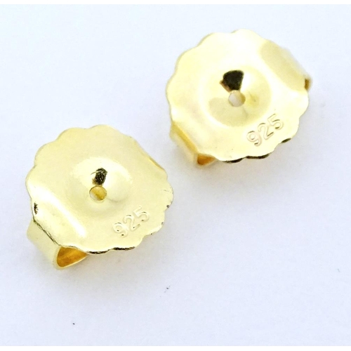 690 - A pair of silver gilt stud earrings set with frog detail approx 1