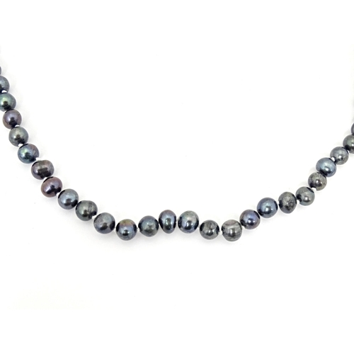 693 - A  black pearl necklace approx 22