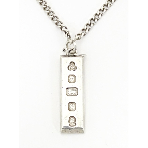 694 - A silver ingot formed pendant hallmarked London 1977. 1 3/4