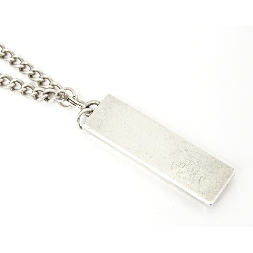 694 - A silver ingot formed pendant hallmarked London 1977. 1 3/4