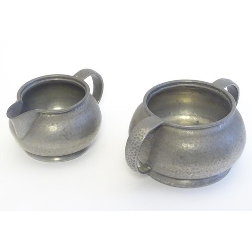 964 - An early 20thC Tudric pewter milk jug and sugar bowl. Both stamped Tudric 01075 under. Sugar bowl ap... 