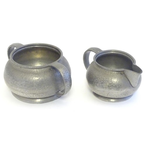 964 - An early 20thC Tudric pewter milk jug and sugar bowl. Both stamped Tudric 01075 under. Sugar bowl ap... 