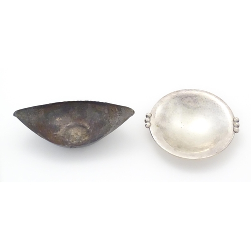 965 - An Art Deco silver plate bon bon dish with hammered decoration and spherical ball handles. Approx 6