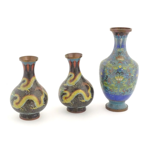 984 - Three Oriental cloisonne vases, one decorated with scrolling floral and foliate detail, and a pair d... 