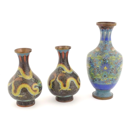 984 - Three Oriental cloisonne vases, one decorated with scrolling floral and foliate detail, and a pair d... 