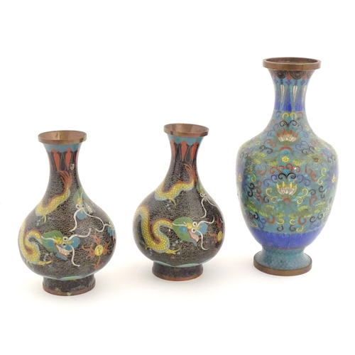 984 - Three Oriental cloisonne vases, one decorated with scrolling floral and foliate detail, and a pair d... 