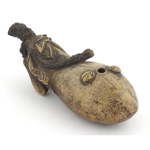 985 - A Chinese stoneware water dropper / dripping vessel modelled as an aubergine / eggplant with relief ... 