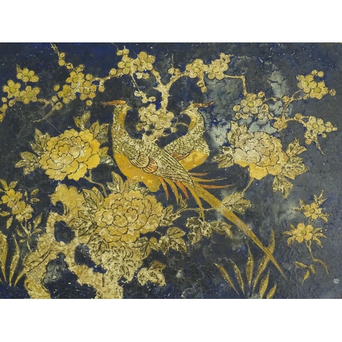 991 - A 19thC lacquered papier mache tray of shaped form decorated with exotic birds amongst flowers and f... 