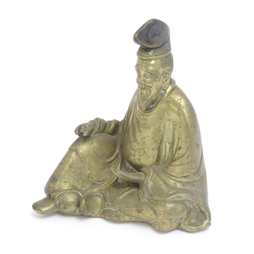 1007 - A 20thC Japanese cast model of a seated gentleman, possibly the scholar Sugawara no Michizane. Appro... 