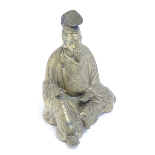 1007 - A 20thC Japanese cast model of a seated gentleman, possibly the scholar Sugawara no Michizane. Appro... 