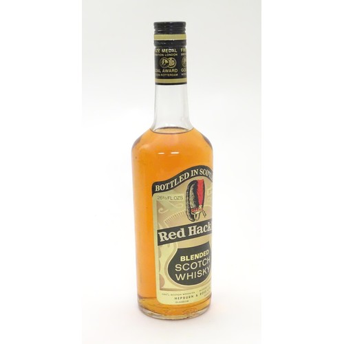 1080 - Whisky : a mid 20thC bottle of Red Hackle blended Scotch Whisky , by Hepburn & Ross Glasgow. 26 2/3 ... 