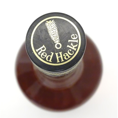 1080 - Whisky : a mid 20thC bottle of Red Hackle blended Scotch Whisky , by Hepburn & Ross Glasgow. 26 2/3 ... 