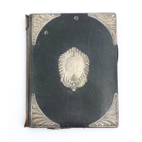 1096 - An early 20thC green leather blotter with embossed silver mounts hallmarked London 1902, maker Willi... 