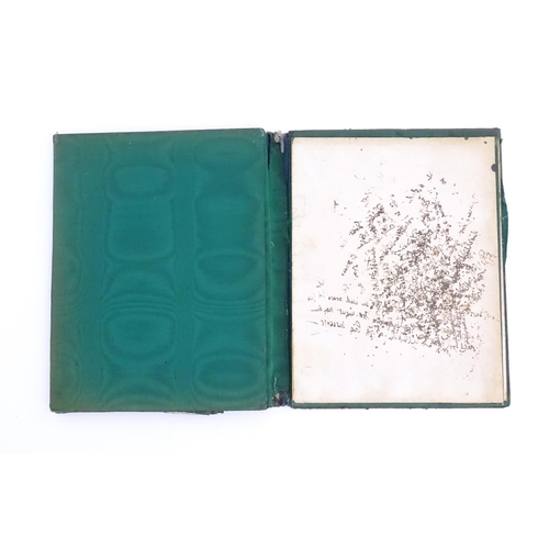 1096 - An early 20thC green leather blotter with embossed silver mounts hallmarked London 1902, maker Willi... 