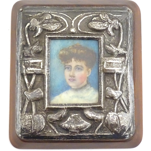 1133 - A late 19thC watercolour portrait miniature on celluloid with an Art Nouveau white metal surround an... 