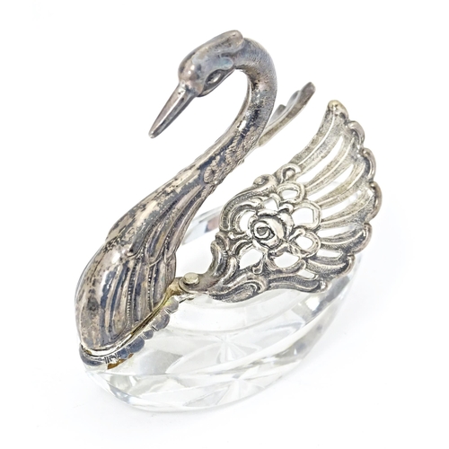 376 - A novelty cut glass salt with silver mounts modelled as a swan, bearing import marked for London 197... 