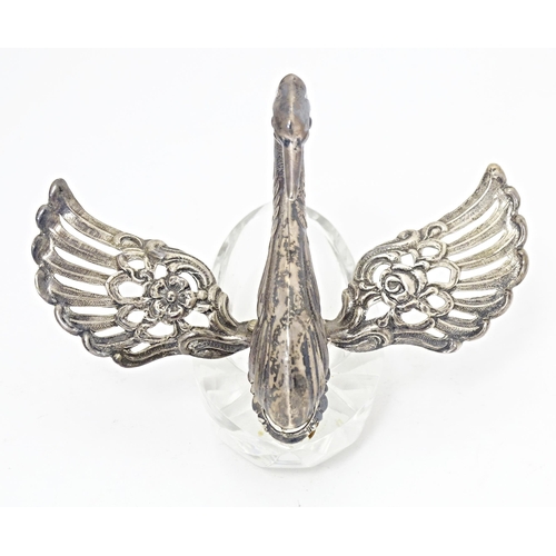 376 - A novelty cut glass salt with silver mounts modelled as a swan, bearing import marked for London 197... 