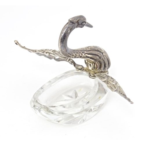 376 - A novelty cut glass salt with silver mounts modelled as a swan, bearing import marked for London 197... 