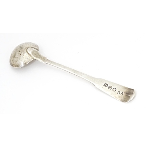 387 - A Geo III silver Fiddle pattern salt spoon hallmarked London 1809, maker John Lias. Together with a ... 