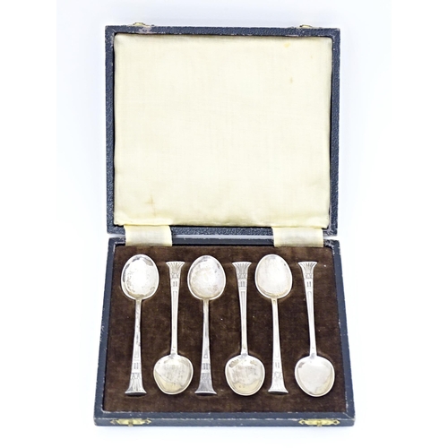 515 - A set of six silver teaspoons with stylised capitals to handles and quatrefoil detail, hallmarked Sh... 